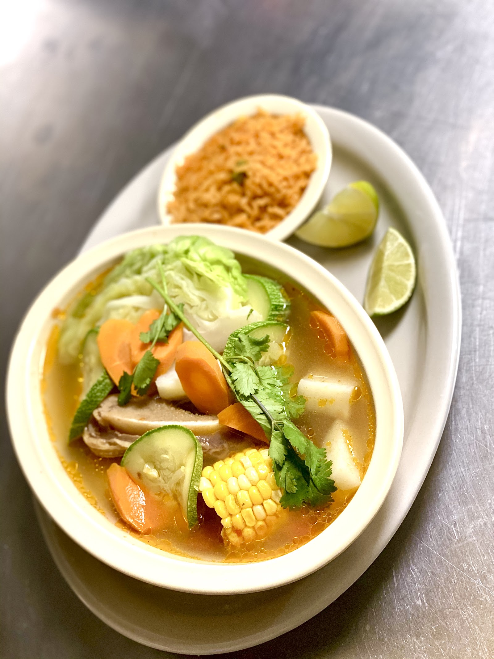 Bowl of menudo at Los Arcos Mexican Restaurant